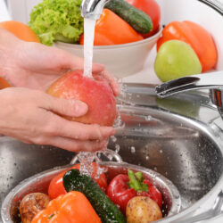 Washing fruits and vegetables close-up; Shutterstock ID 219001450; purchase_order: -; job: -; client: -